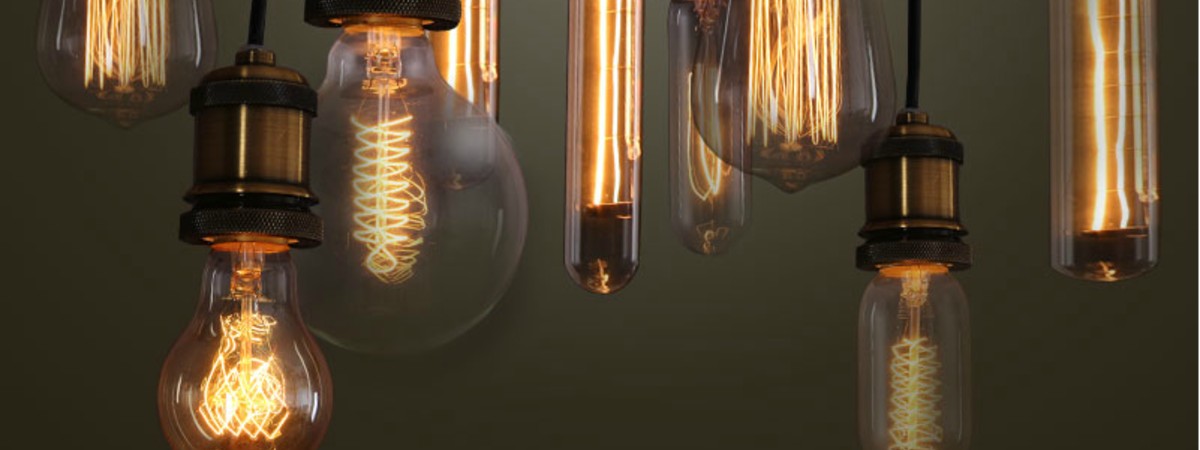 A variety of shapes and styles of Edison Light Bulbs hanging on pendant lamps
